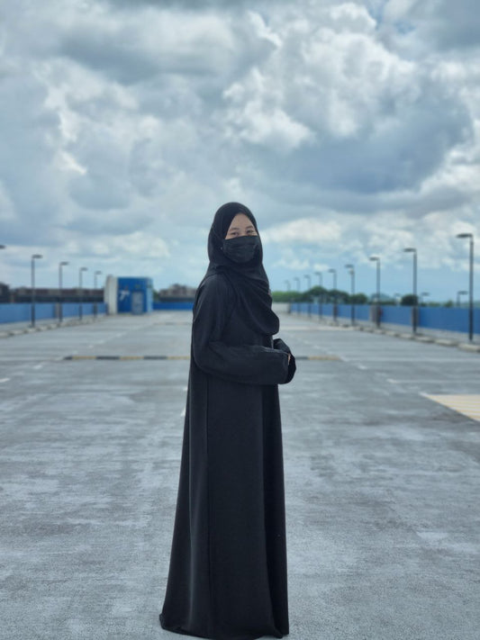 Jubah Dina